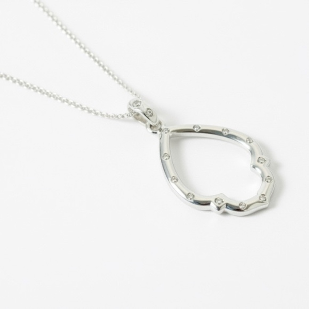 Vintage Avon (produced by SAQ Manufacturing) silver finish necklace/cz & pendant